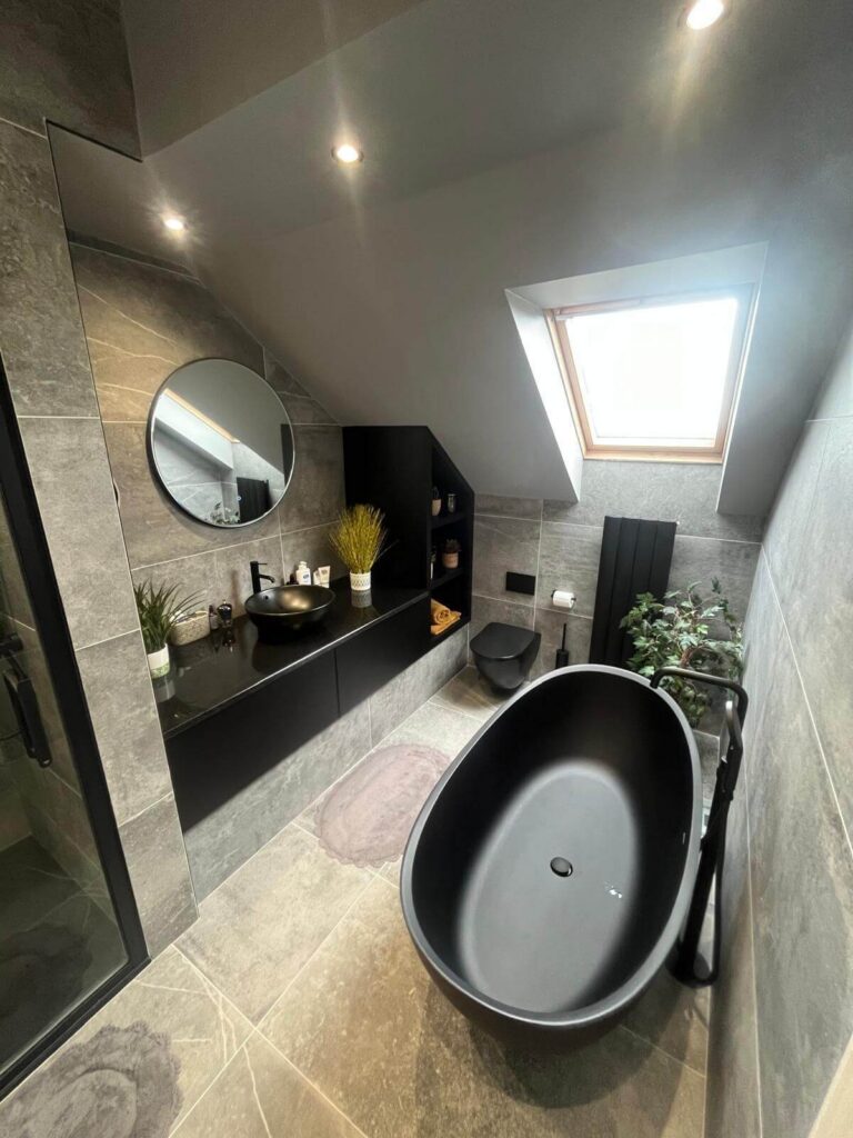 black bath tub in bathroom