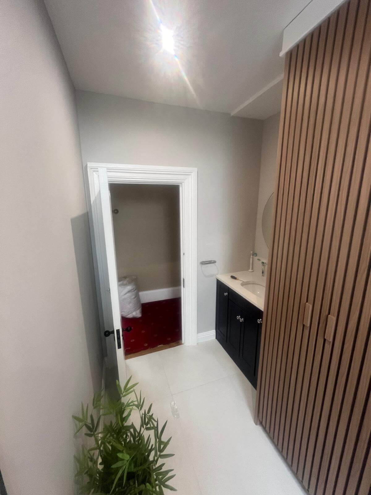 timber style wall and sink